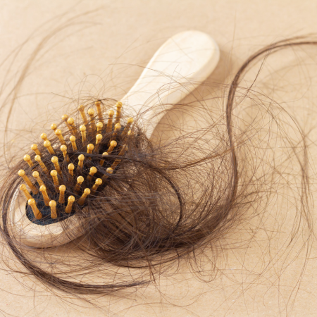Managing Postpartum Hair Loss: Causes, Solutions, and Tips